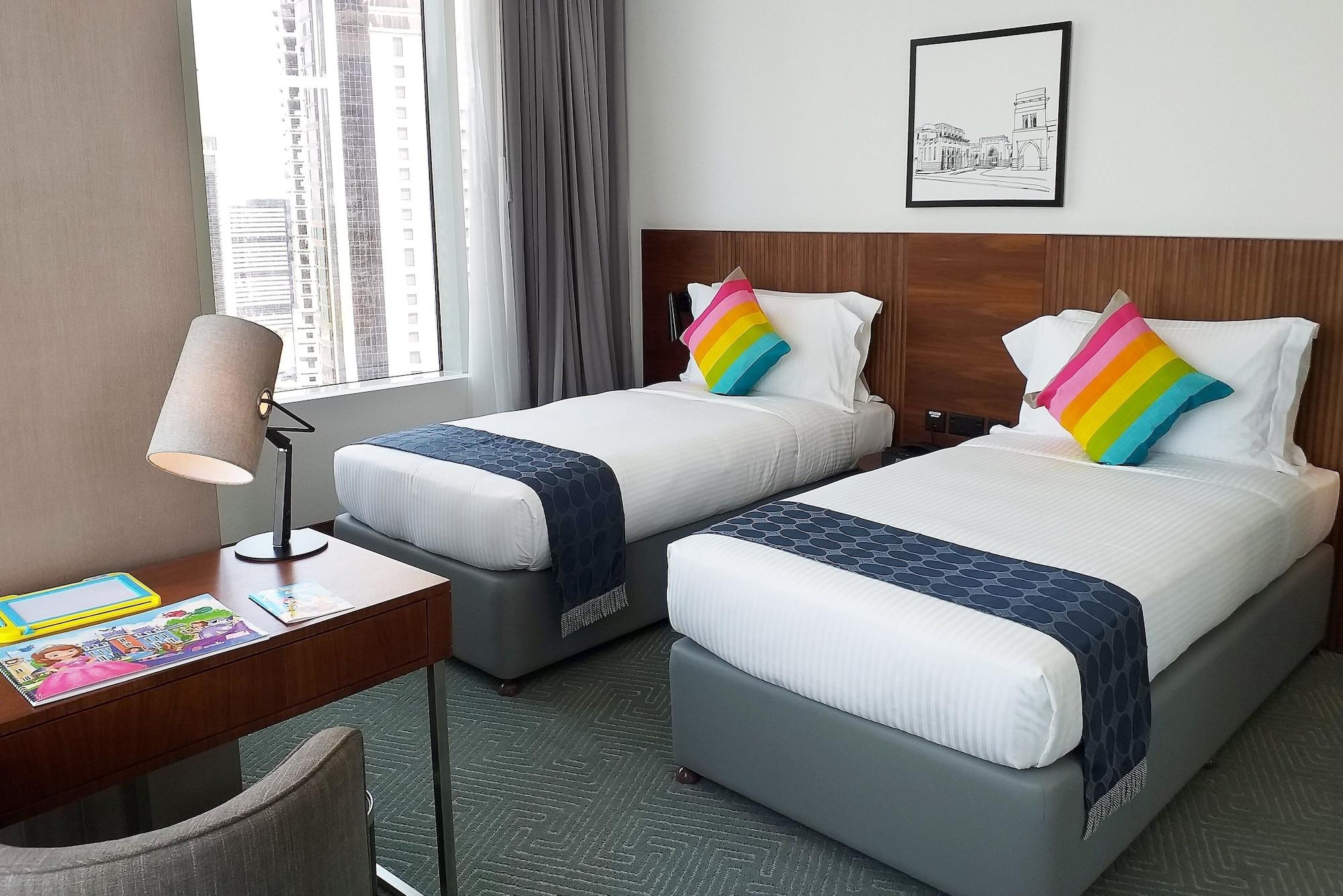 서머셋 웨스트 베이 도하 호텔 외부 사진 A room at the hotel