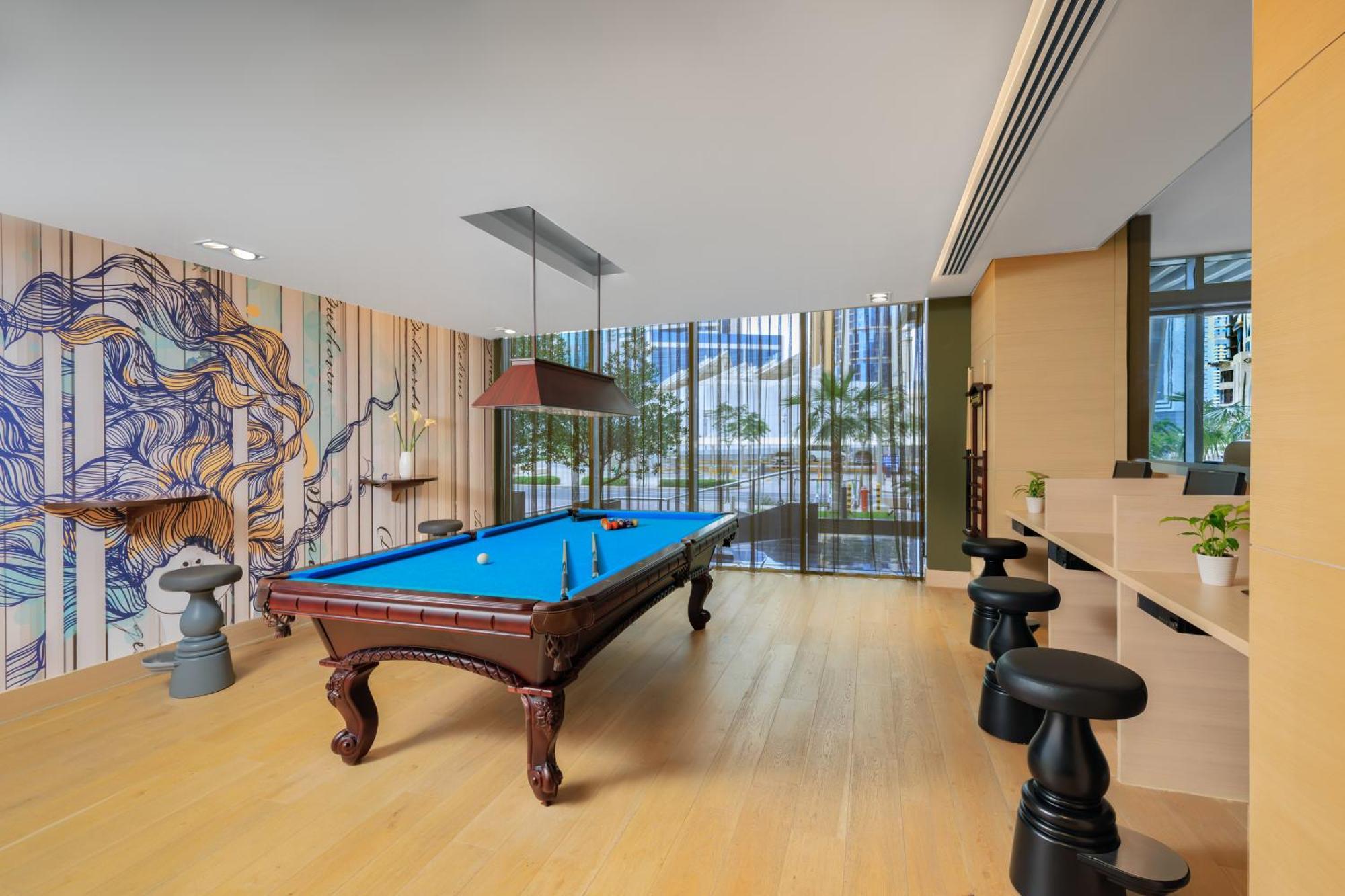서머셋 웨스트 베이 도하 호텔 외부 사진 The Billiard Room