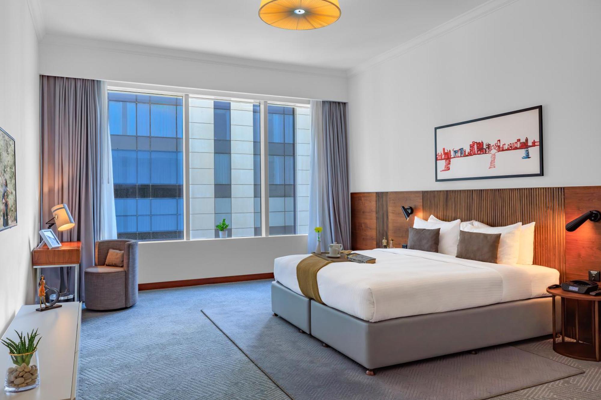 서머셋 웨스트 베이 도하 호텔 외부 사진 Deluxe Room